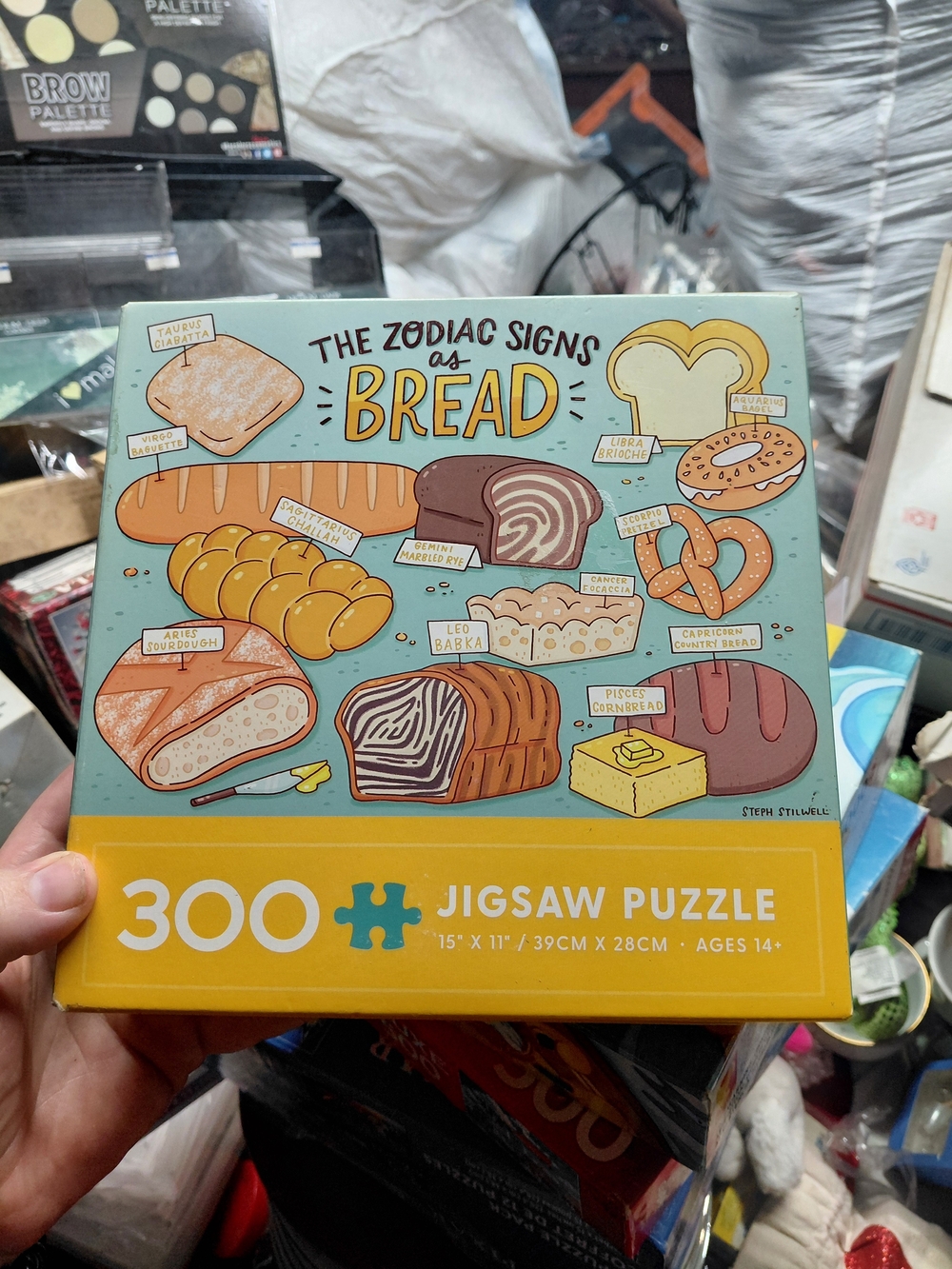 300-piece "The Zodiac Signs as Bread" jigsaw puzzle by Ceaco.
